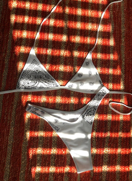Angel Bottom - The Tropical Societywhite bandana bikini, paisley print swimsuit, paisley bikini, paisley white print, Paisley triangle bikini, paisley bikini top, bandana top,   bandana bucket hat, street wear, street style swimsuit, streetwear bikini, summer 2022 bikinis, trendy bandana bikini, bandana outfit